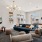 a lounge with ample seating and a shuffle board
