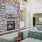 resident lounge with fireplace and television