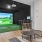 a golf simulator with lounge seating
