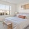 Bedroom with natural lighting and high ceilings
